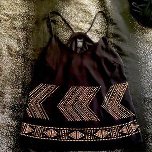 This spaghetti strap is polyester very cute just too small for me